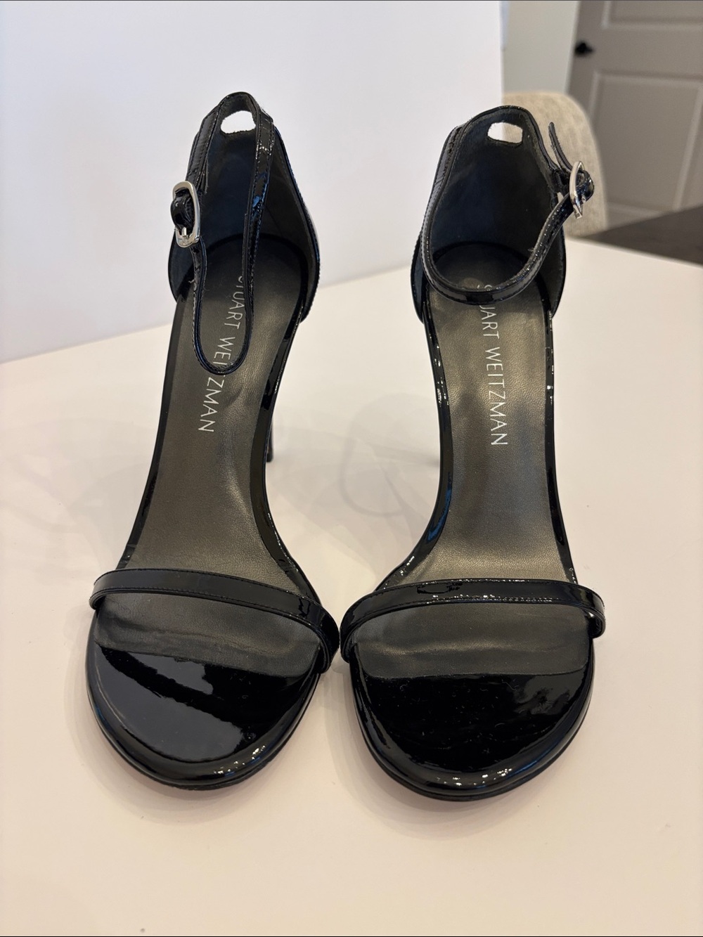 Stuart Weitzman, black patented sandal
$275.00